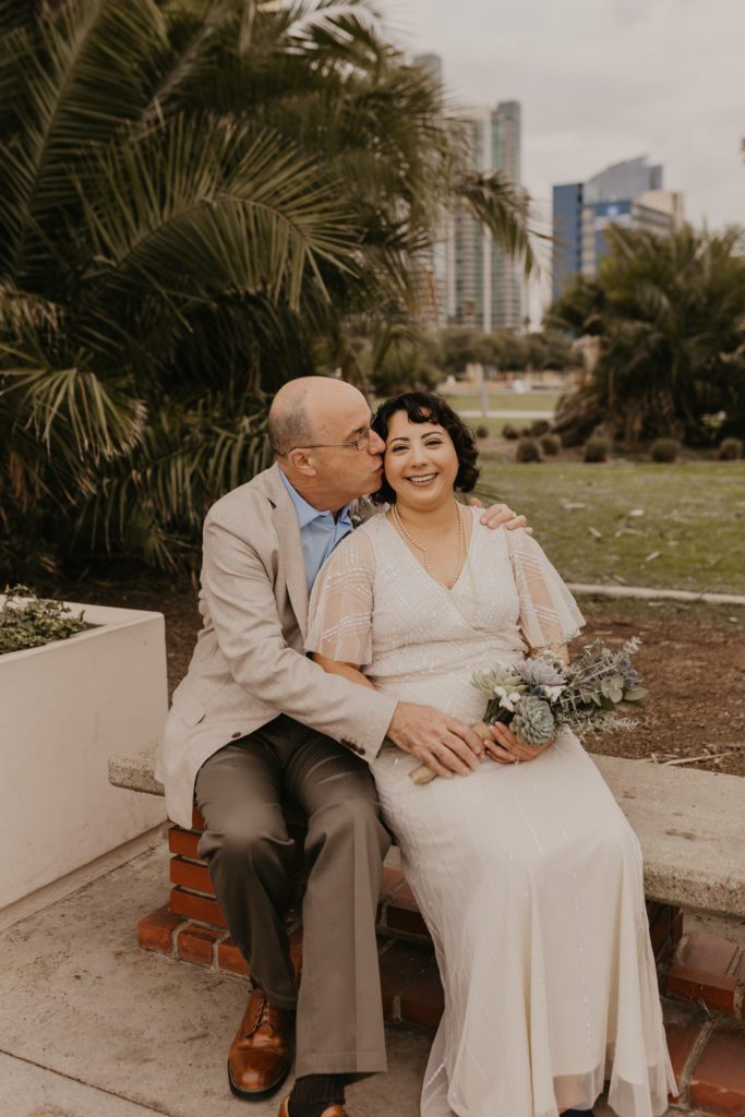 Couple after eloping in Downtown San Diego
